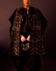 Guneet Monga In Cape top, woven overlay & draped skirt